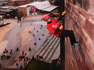 Mary Goodwin abseils down Coventry Cathedral